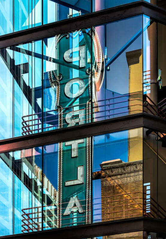 I happened to glance up while walking down the street and noticed the Portland sign reflected in the windows of the Newmark Theater. I love the combination of reflections with the railings and lights of the staircase inside.