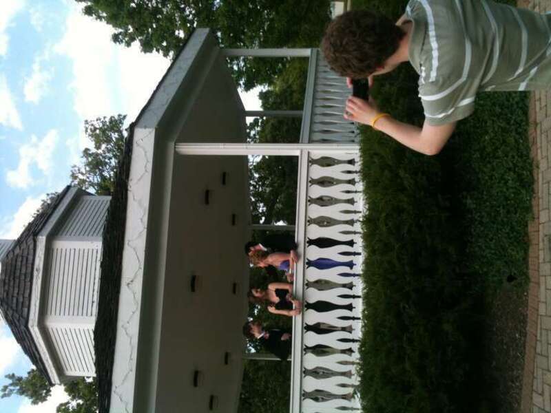 Before Prom, couples gather in a local park in a gazebo for pictures by families. Groups of couples arrange to meet at this location for photographs of couples and groups.  Family members take pictures.