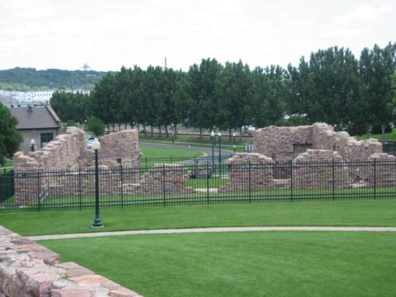 Ruins of the Queen Bee Mill in Falls Park in Sioux Falls, South Dakota, USA. The building was originally constructed in the late 19th century and was only operational for a few years. A fire gutted most of the building in the 1950's, and the top five