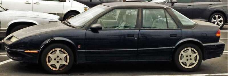 Saturn compact car, also seen in the Arby's parking lot.