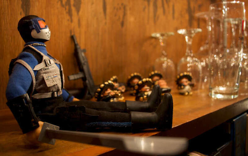 500px provided description: Snake eyes enjoys an evening off.

Snake Eyes was my favorite G.I. Joe growing up. The best ninja around [#macro ,#toy ,#still life ,#toys ,#snake eyes]