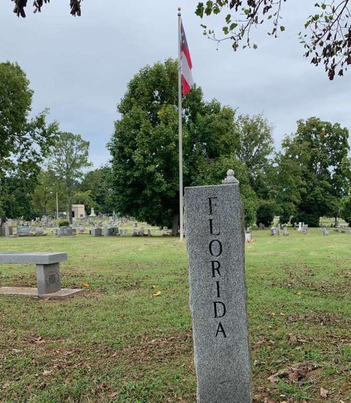 The peripheral post for the State of Florida in the outer periphery of Confederate Circle in Evergreen Cemetery. A post for each state of the Confederacy marks the edge of the Circle. Known individual burial markers are located near the corresponding