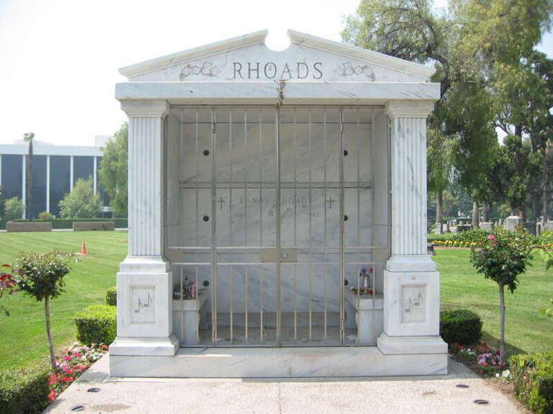 Tomb of Randy Rhoads. Photo taken on 8 May, 2006 in San Bernardino, California.
I am the author of this photograph and I hereby release it into the public domain.

Note the lipstick &quot;kisses&quot; all over the tomb.