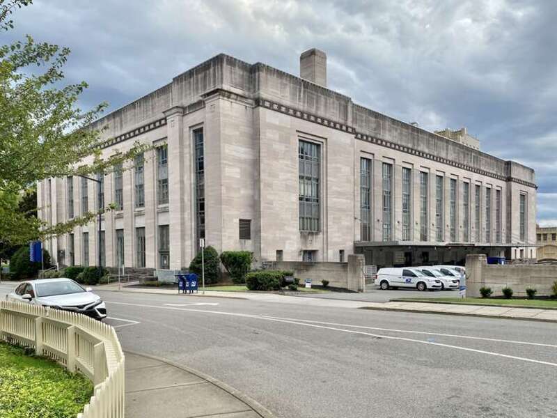 Built in 1932-34, this Art Deco, Art Moderne, and Stripped Classical Revival-style Post Office and Federal Building was designed by Baumann and Baumann to replace the earlier Old Custom House and Post Office in Downtown Knoxville on Market Street,