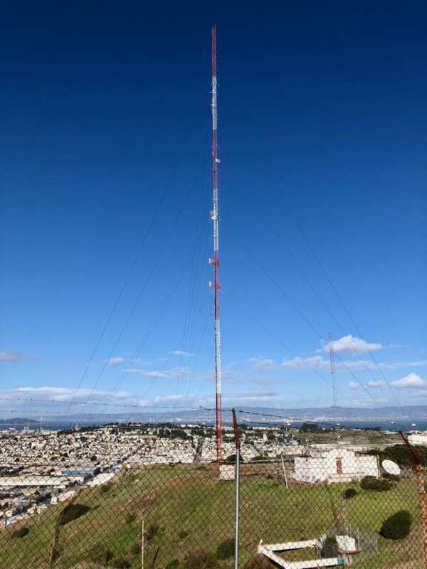 View of radio tower (FCC Tower Registration 1053379) from Bayview Park in San Francisco, California - taken in February 2018.