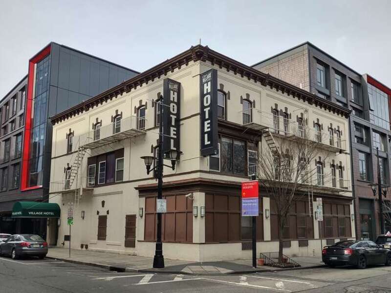 Looking west across New and Halsey Streets at hotel