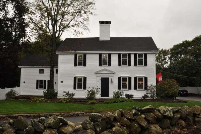 A photograph of the historic Samuel Train House in Weston, Massachusetts.