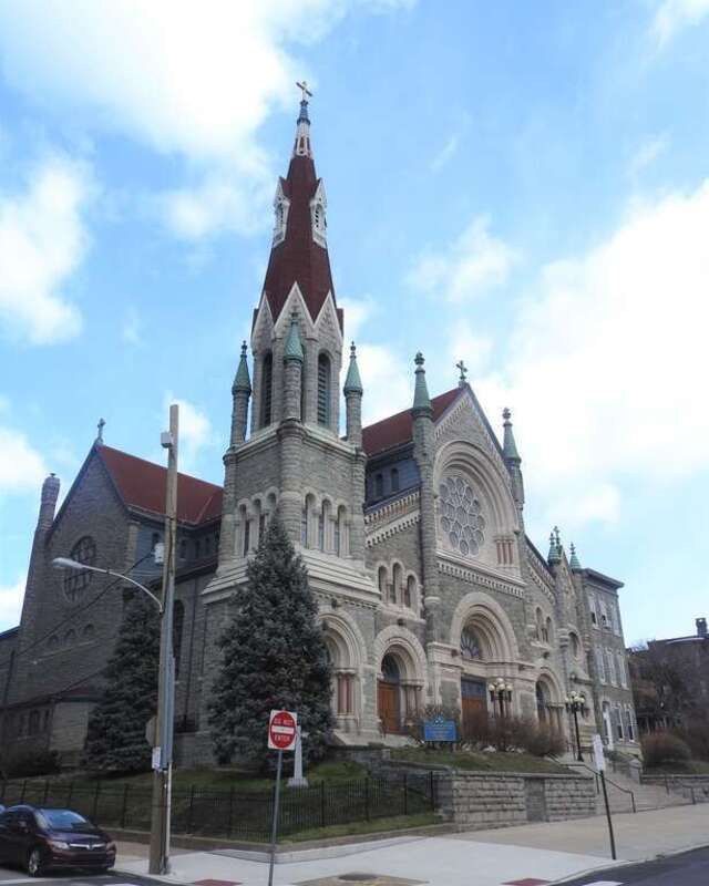Looking northeast at a church as clouds begin to dissapate