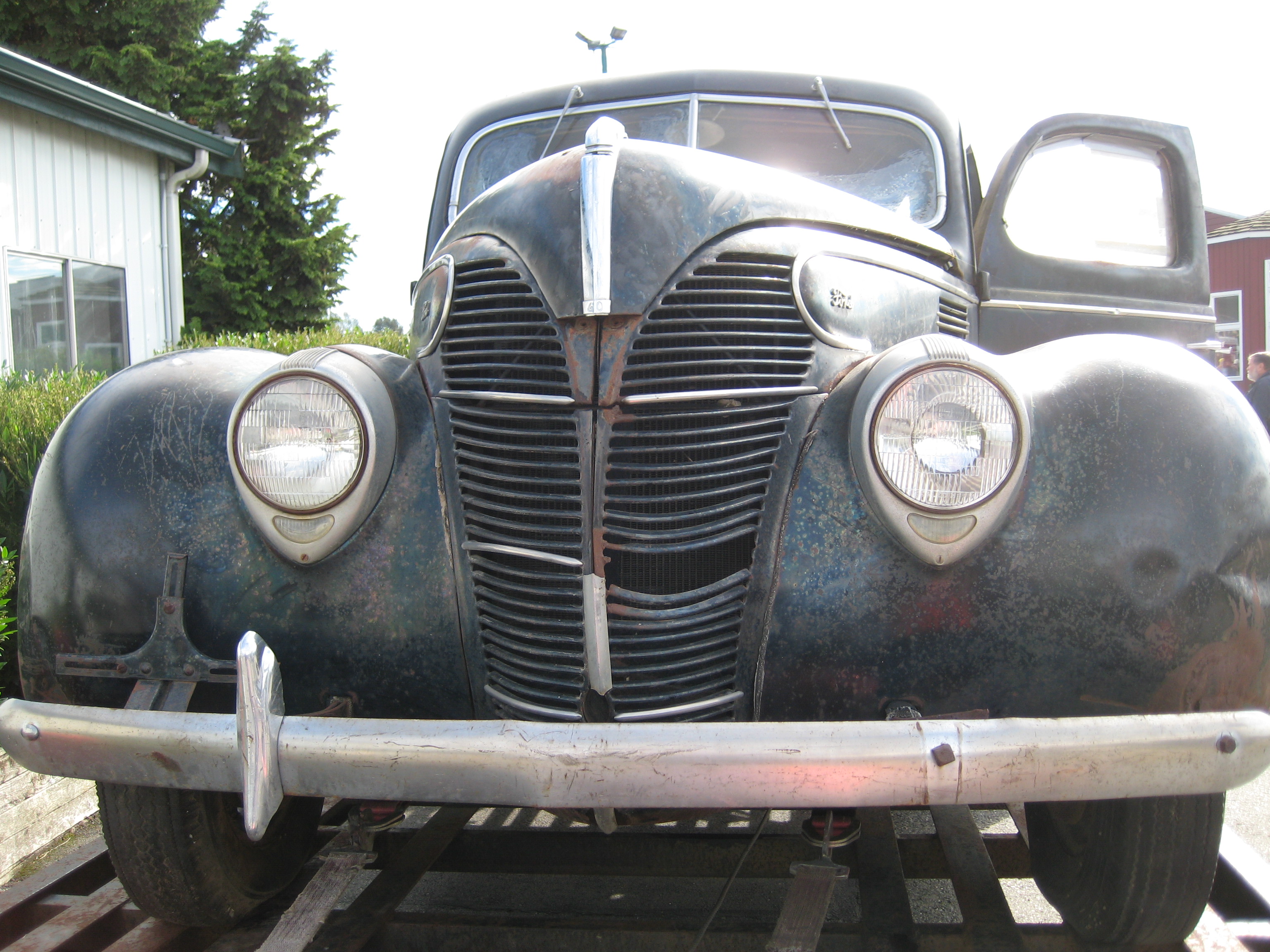 Those sealed beam brackets must be aftermarket, as the don't quite look like the ones used for 1940.

Antique Auto Restorers Club of Bellingham October Swap Meet 2011 held at the Evergreen State Fairgrounds in Monroe, Washington.