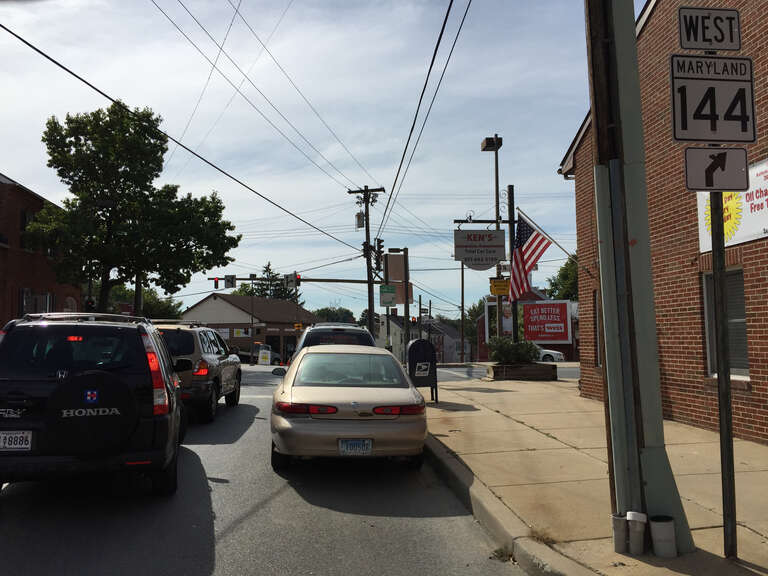 View west along Maryland State Route 144 (Patrick Street) at Jefferson Street in Frederick, Frederick County, Maryland