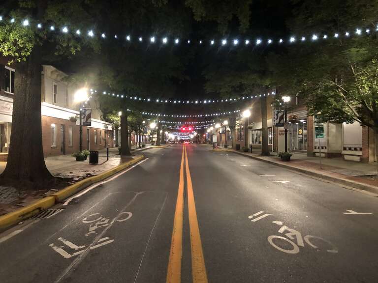 Night view eastward along Loockerman Street at New Street in Dover, Kent County, Delaware