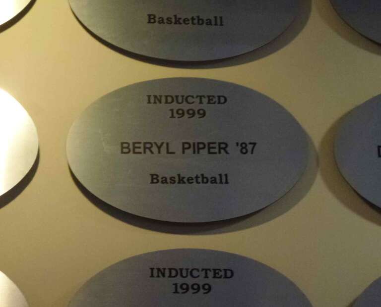 Plaque, commemorating the induction of Beryl Piper, into the CCSU Athletic Hall of Fame. As of 2013, Piper is the Head coach of the Central Connecticut State University women's basketball team.
