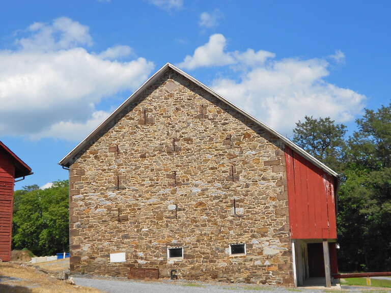 Barn at the Michael and Magdealena Bixler Farmstead, listed on the NRHP on July 27, 2000. Located at 400 Mundis Race Road, East Manchester Township, York County, Pennsylvania.  The house is now the main office of the York County Parks department and