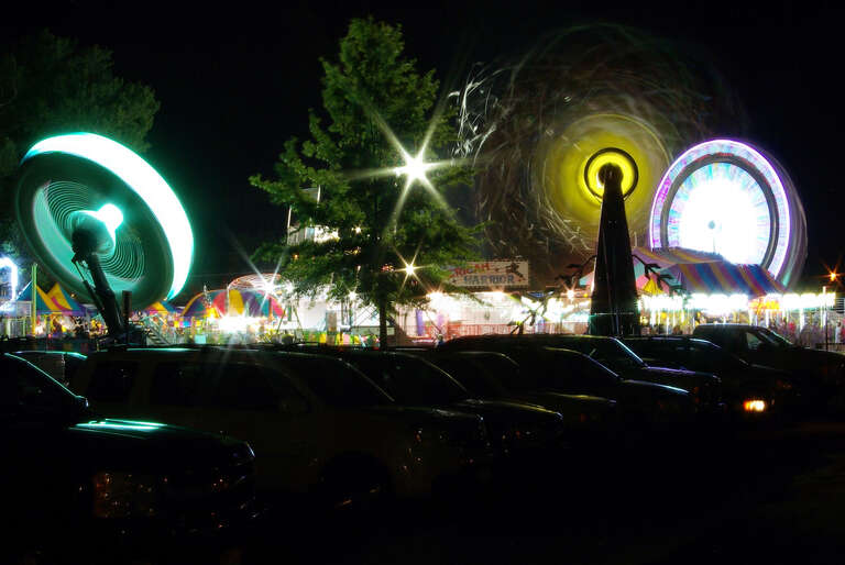 500px provided description: Carson City 4th Of July 2017 [#city ,#sunset ,#street ,#water ,#travel ,#light ,#urban ,#cityscape ,#summer ,#silhouette ,#evening ,#sight ,#dark ,#outdoors ,#illuminated ,#dusk ,#landmark ,#Nevada ,#Timed Exposure]