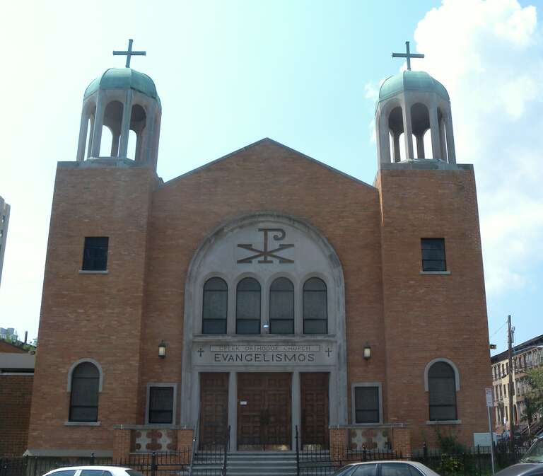Looking south across Montgomery Street east of Summit Avenue at Greek Orthodox Church on a sunny midday with bad light.  ZIP 07306.