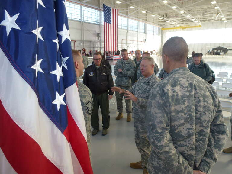 CLAY NATIONAL GUARD CENTER, Marietta, Ga. Jan 8, 2015 - General Frank J. Grass, Chief of the National Guard Bureau, speaks with Citizen-Airmen of the Georgia National Guard before a change of command ceremony for the state's adjutant and assistant