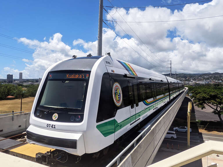 A Honolulu Skyline train departing Hālawa (Aloha Stadium) station.
