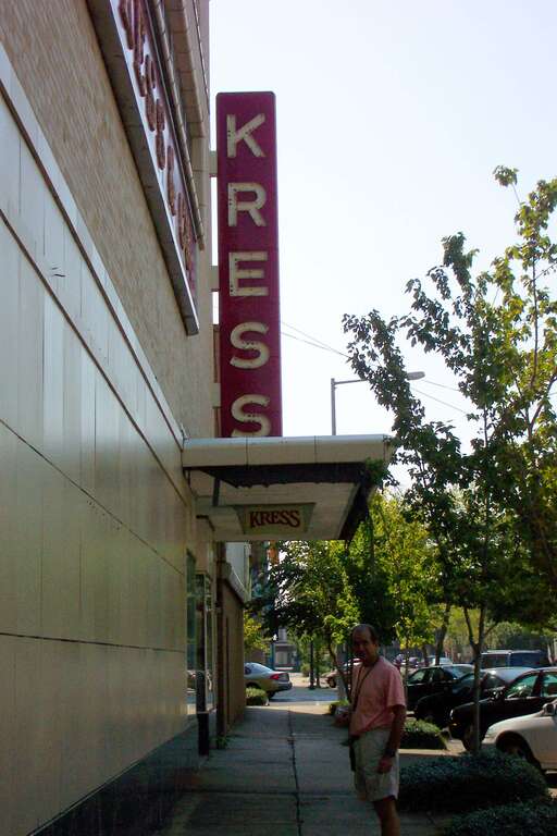 Built in 1934, this three-story Art Deco building has facades on Fifth and Sixth streets. Designed by Edward F. Sibbert, it 
is typical of his work in the early 1930s. The facade is pale brick and terracotta with darker polychrome terracotta