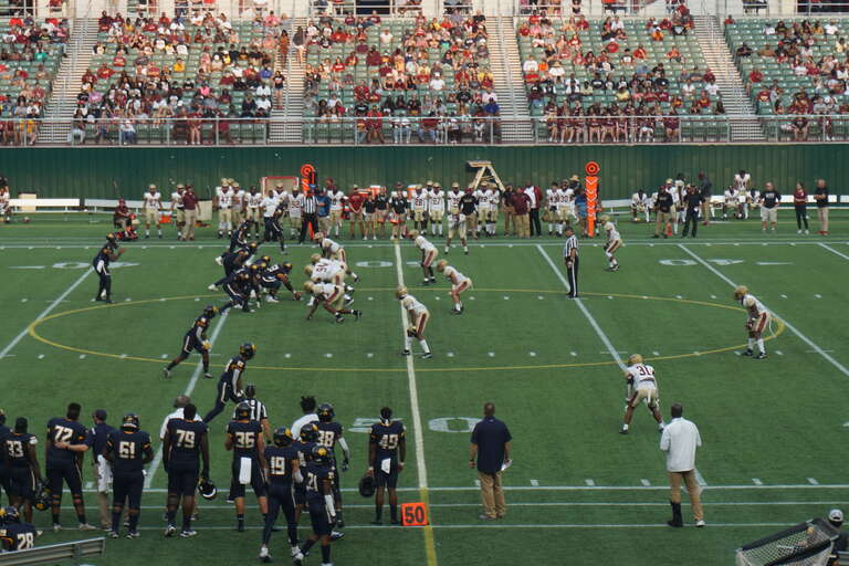 A&amp;amp;M–Commerce on offense during the Midwestern State Mustangs vs. Texas A&amp;amp;M–Commerce Lions football game at Choctaw Stadium in Arlington, Texas (United States). Midwestern State won 31–30.