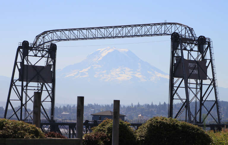 500px provided description: Mount Rainier Framed [#volcano ,#bridge ,#mountain ,#frame ,#lift bridge ,#Tacoma ,#Mount Rainier ,#11th Street Bridge ,#Murray Morgan Bridge]