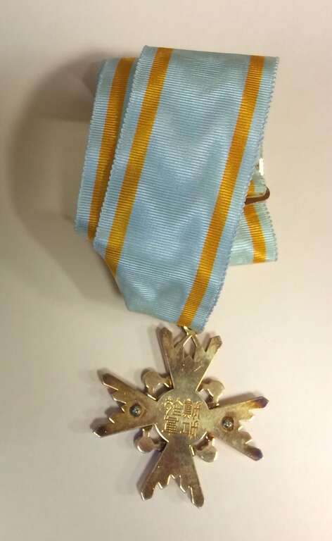 Order of the Sacred Treasure, Third Class, (Japanese decoration) - medal. The specimen exhibited in the picture was the one awarded to John Curtis Perry.