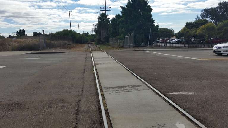Rail going into UTC Aerospace Systems crossing F Street.