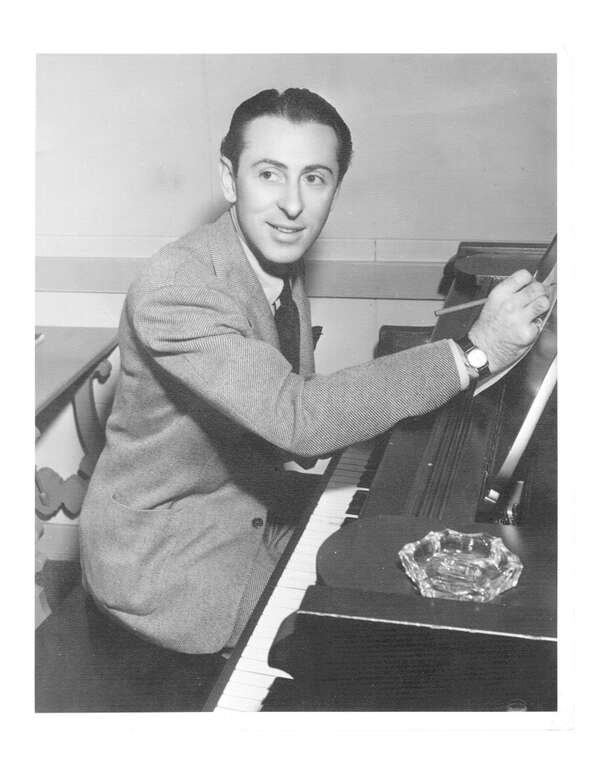 Ralph Freed lyricist at piano MGM c1940s