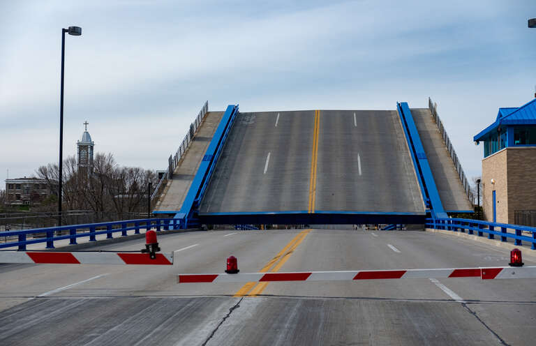 Roadway view of the 8th Street Bridge (over the Sheboygan River) in Sheboygan, Wisconsin, with its bascule deck raised
