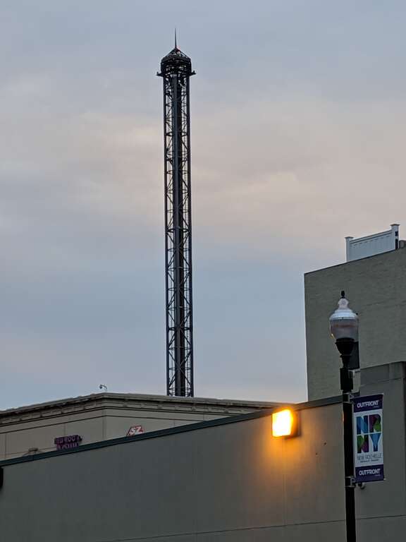 The Space Needle (185'x8'x8') ride atop New Roc City is a 12 seat roller coaster type ride