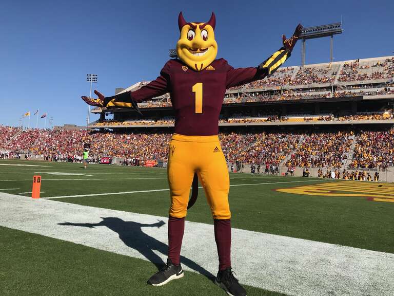 Sparky the Sun Devil is on the sideline of an ASU football game in 2019.