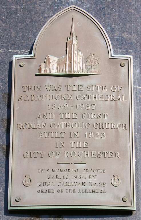 A plaque marking the location of the former St. Patrick Cathedral in Rochester, New York.