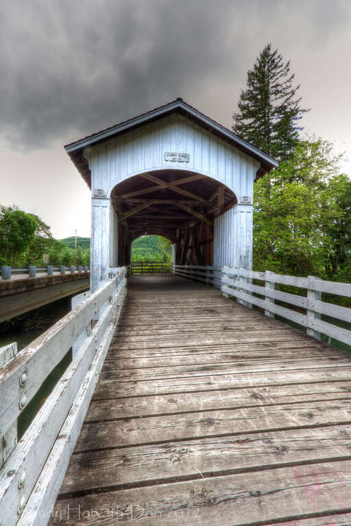 As with other wooden bridges in Oregon, the Stewart Bridge has had its share of woes. Heavy rains of the 1964 &quot;Christmas Flood&quot; brought water raging down Mosby Creek with the resulting force cracking the lower chords of the bridge.
Just over four
