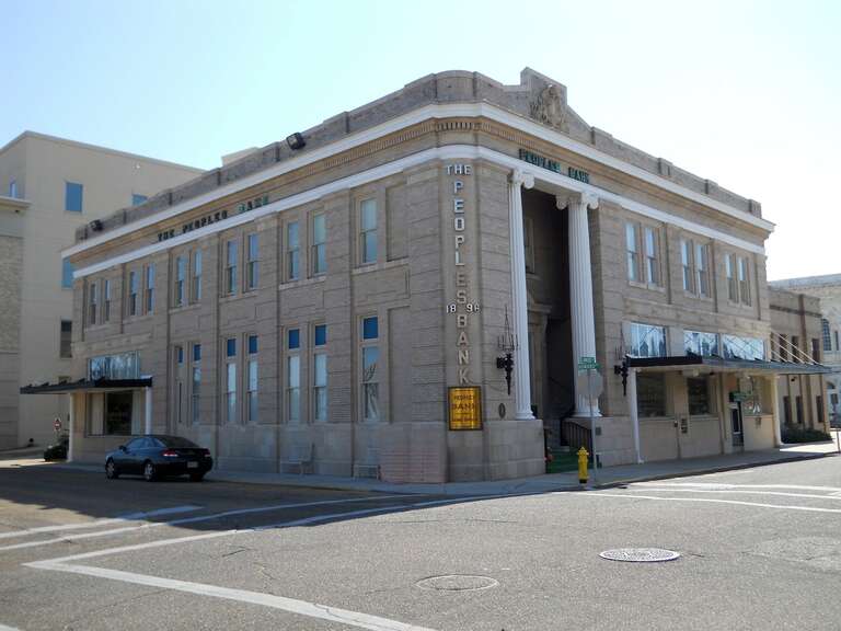 The Peoples Bank at 318 Lameuse Street, Biloxi, Harrison County, Mississippi, USA.  Constructed in 1914 using Beaux Arts architectural style.  Added to National Register of Historic Places on May 18, 1984.