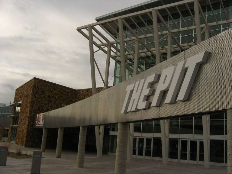 The Pit Arena, is a basketball-only arena in Albuquerque, New Mexico, It serves primarily as the home of the University of New Mexico Lobo basketball teams. The arena seats 17,126 for basketball, has 40 luxury suites, and 350 club seats. The Pit