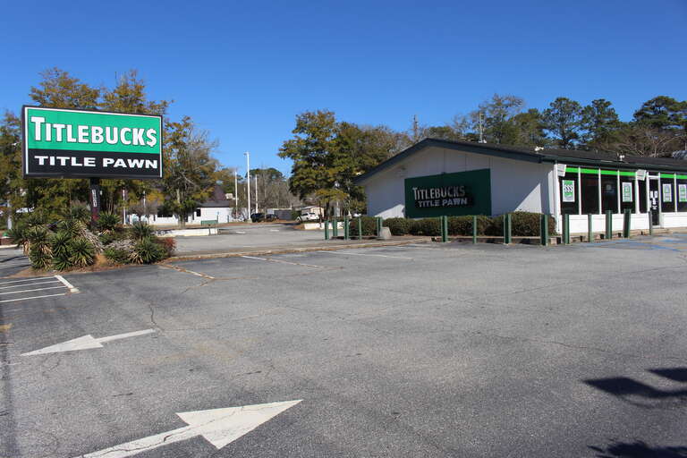 Titlebucks Title Pawn, Valdosta, Lowndes County, Georgia. This was formerly a restaurant named Top Corral, a hamburger place, back in the 80s.
