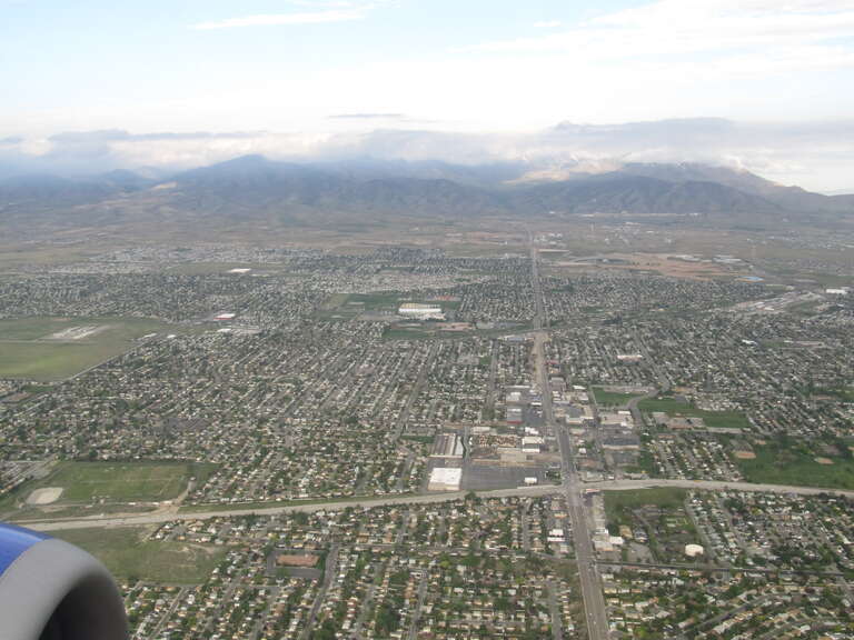 The Utah Olympic Oval, an indoor speed skating oval built for the 2002 Winter Olympics, is located 14 miles (23 km) southwest of Salt Lake City, in Kearns, Utah. The Oval hosted the long track speed skating events for the 2002 games. Inside the
