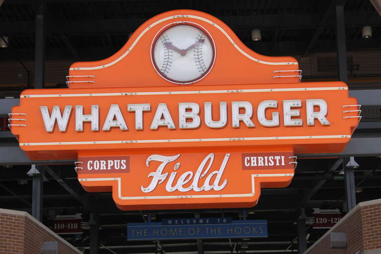 Whataburger Field sign located in Corpus Christi, TX; at the bottom, it reads &quot;Welcome to the Home of the Hooks&quot;
