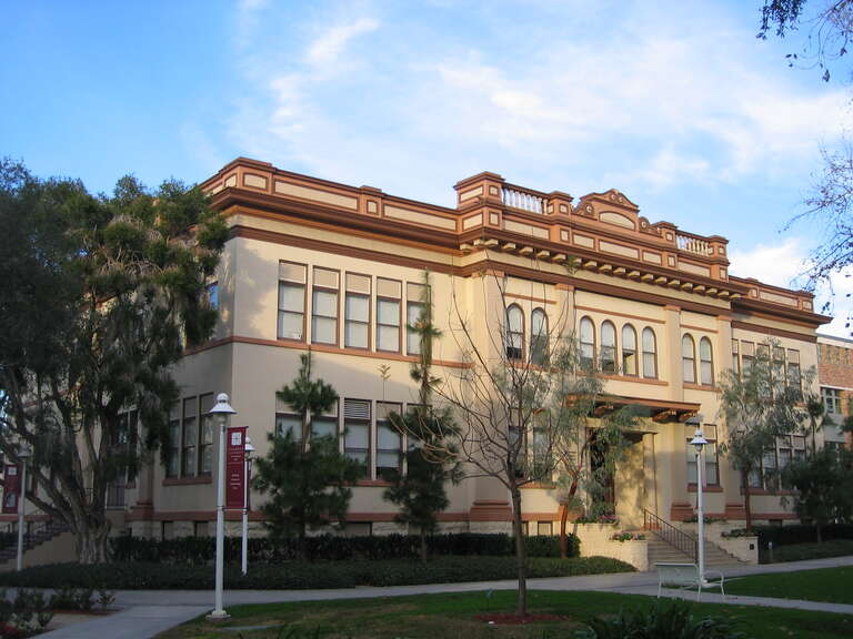 Wilkinson Hall on the Chapman University campus in Orange, California was formerly used as Orange Union High School. Originally called “Central”, Wilkinson Hall was designed by L.A. architect A. Dudley and constructed by R. J. Noble Company of Long