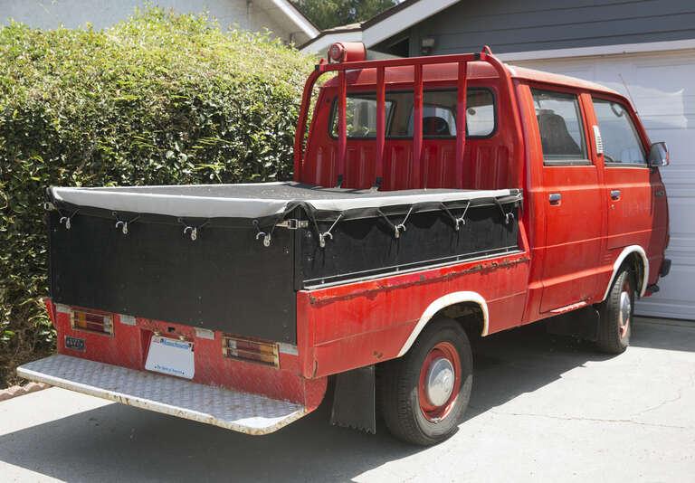 1981 Toyota HiAce double cab truck seen in Eagle Rock, Los Angeles. Used to belong to a Fire Department, registered in Massachusetts to circumvent California's very particular emissions regulations. Model code RH24-JRP3, fitted with 1.6-liter 12RJ