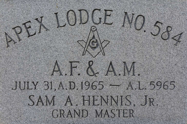 Front side of the corner stone for Apex Masonic Lodge