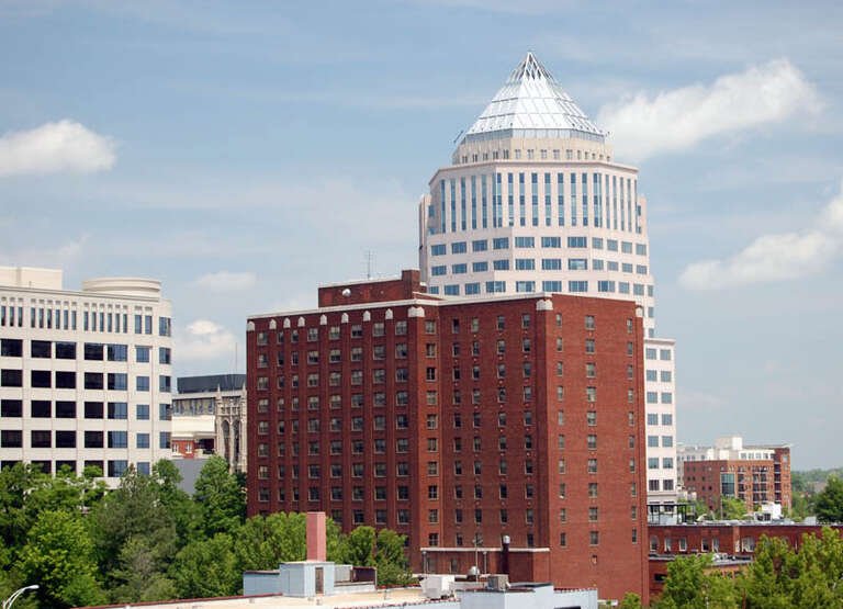 Barringer Hotel, 426 N. Tryon St. Charlotte (Brick building in the foreground. Also known as the Hall House)