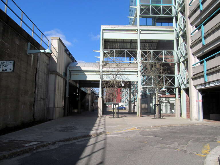 The canopy between the garage and platform at Lynn station in April 2015. This space was reportedly left for a future Blue Line station.
