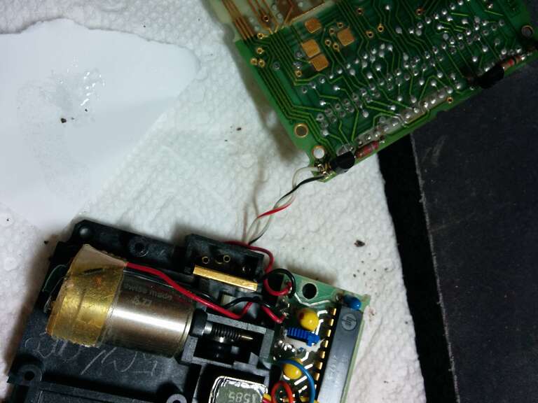 Card reader unit from calculator HP-67 with motor and drive train, el. connection to mainboard (above)
