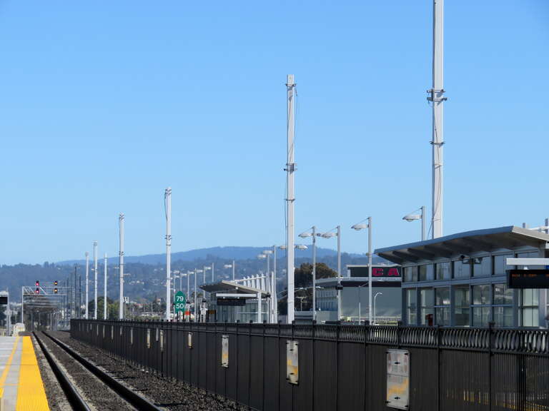 Catenary poles at San Bruno station in June 2018