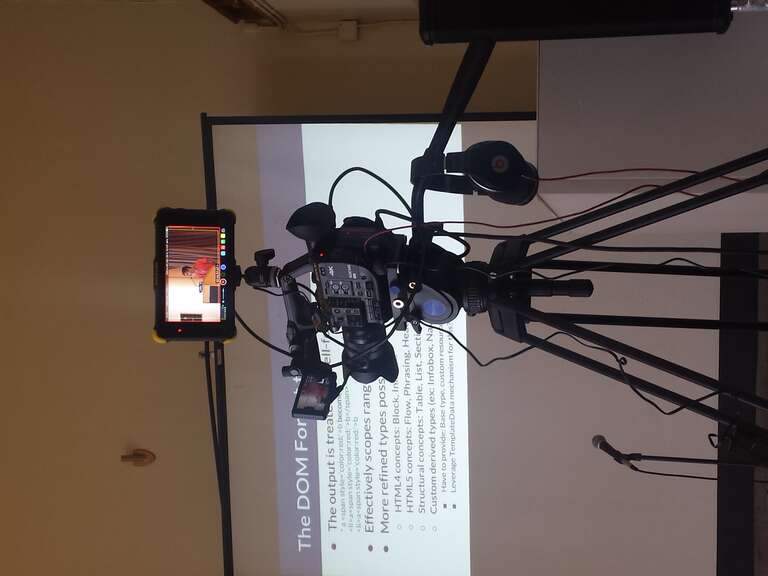 Some pics from https://www.mediawiki.org/wiki/Wikimedia_Developer_Summit/2017 featuring its venue, attendees or other details.