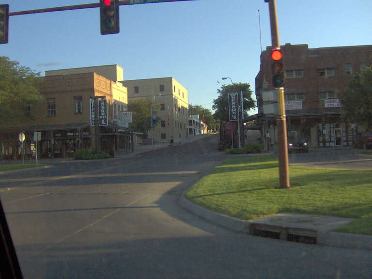 Buildings along First Avenue in downtown Dodge City, Kansas, United States, as viewed from its intersection with Wyatt Earp Boulevard (U.S. Routes 50/400).  This part of downtown is within the boundaries of the Dodge City Downtown Historic District,