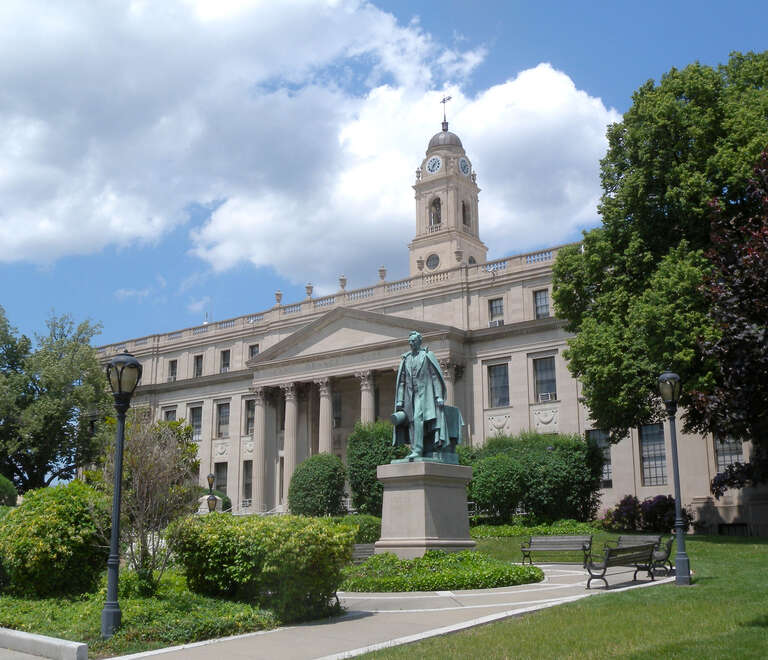 Looking northwest at City Hall of en:East Orange, New Jersey on a sunny midday with en:Abraham Lincoln statue in foreground.
