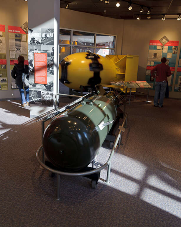 Models of the two atomic bombs dropped on Japan during World War II. The near one is 'Little Boy', a bomb using Uranium 235 as its chain reaction fuel. The far one, 'Fat Man', used Plutonium 239. Little Boy was dropped on Hiroshima, and Fat Man on