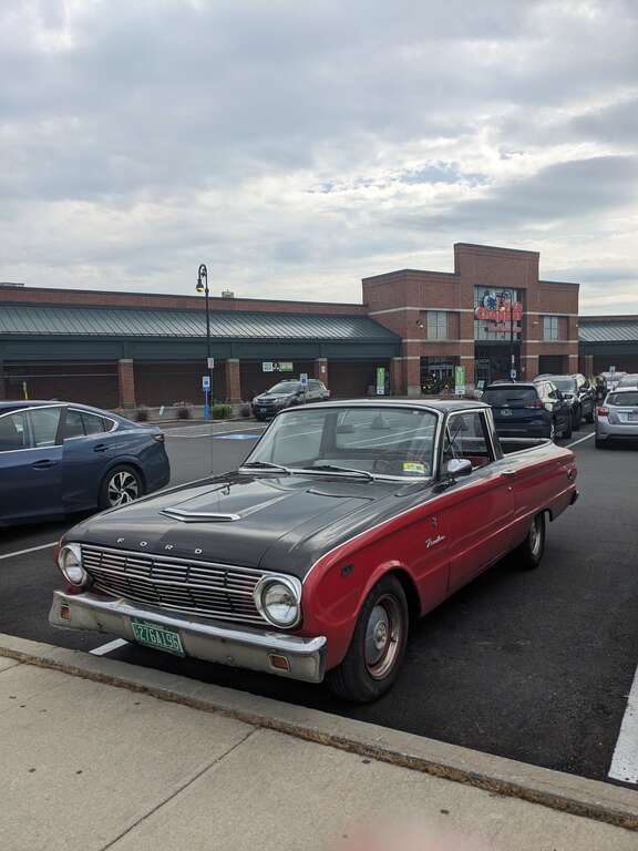 Ford Falcon Ranchero parked at Rutland Plaza, 1 Rutland Street in downtown Rutland, Vermont (left side view).