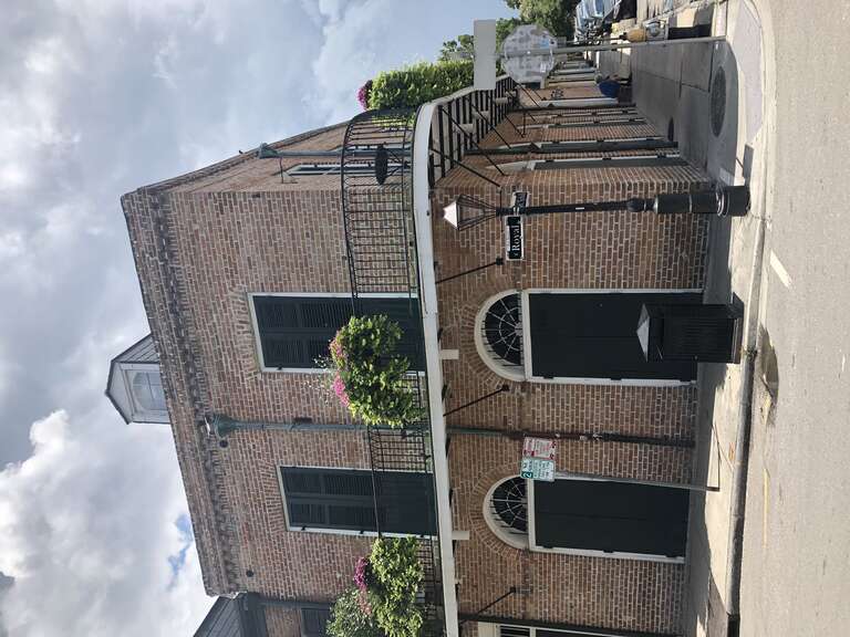 Dwelling house in the historic French Quarter of New Orleans, Louisiana.  Uptown lake corner of Royal and Governor Nicholls Streets.